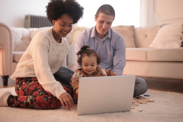 Young family on laptop